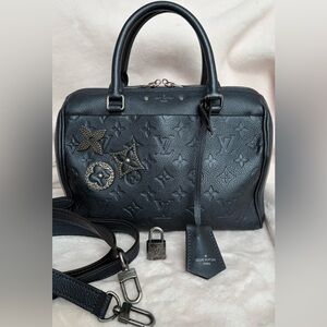 Louis Vuitton Monogram Empreinte Speedy Bandouliere 25 M43740 Dark blue